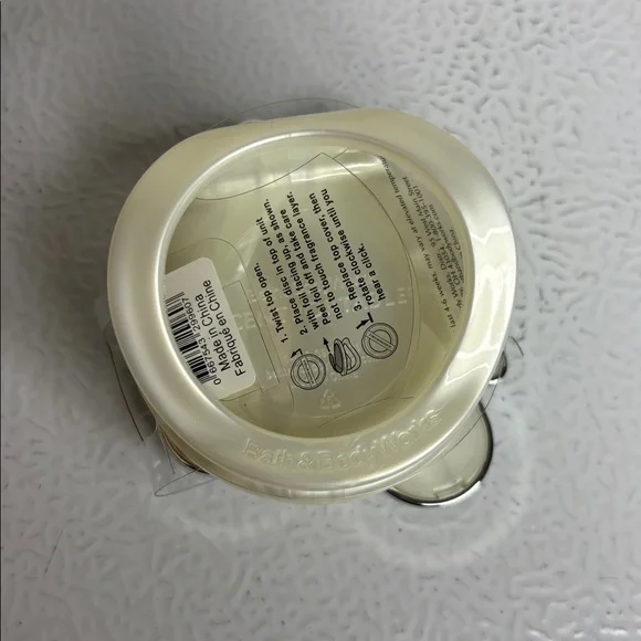 Bath & Body Works Silver and Teal Mitten Fragrance Holder For car - Picture 2 of 2